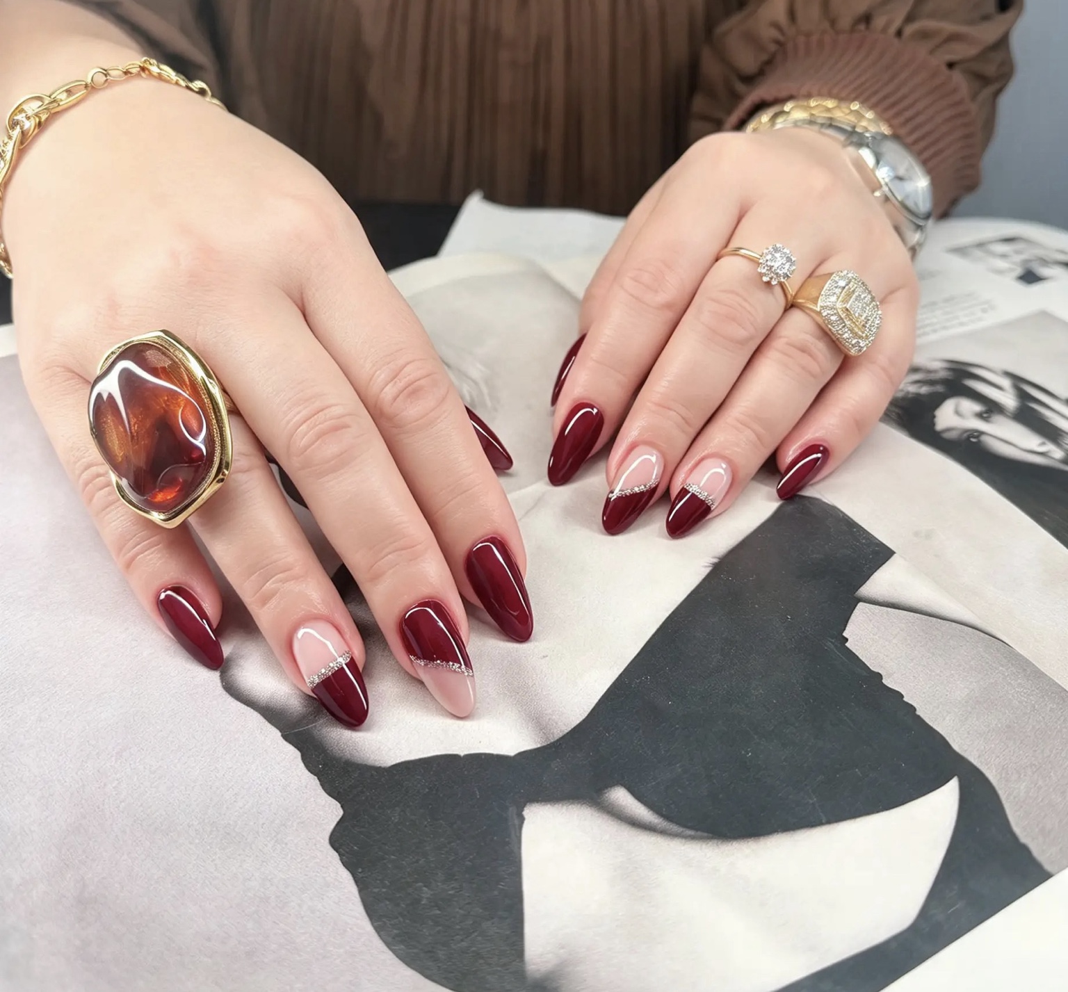 Burgundy & silver accents nail design at Marjan Lux Beauty